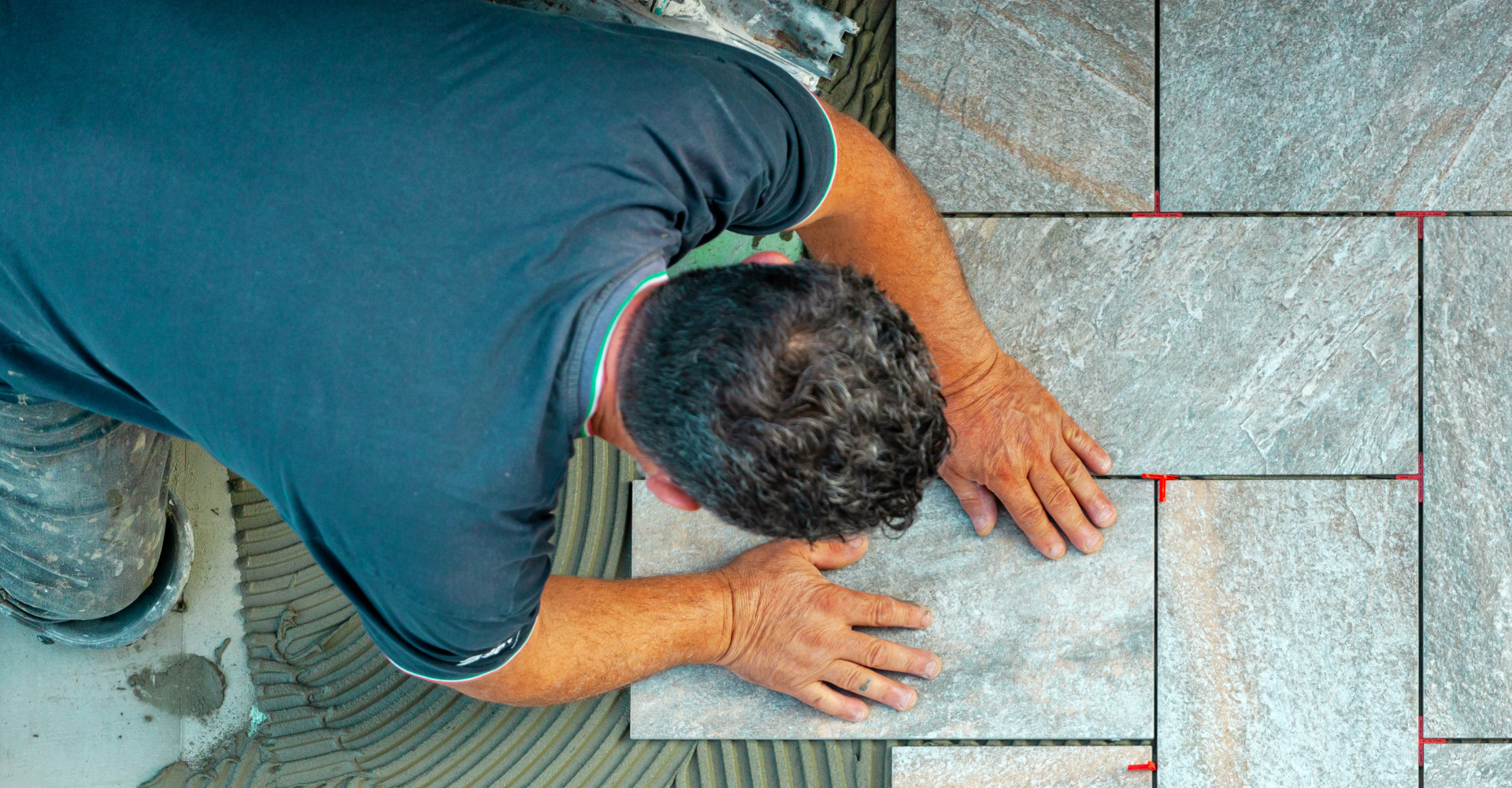 A tiler at work