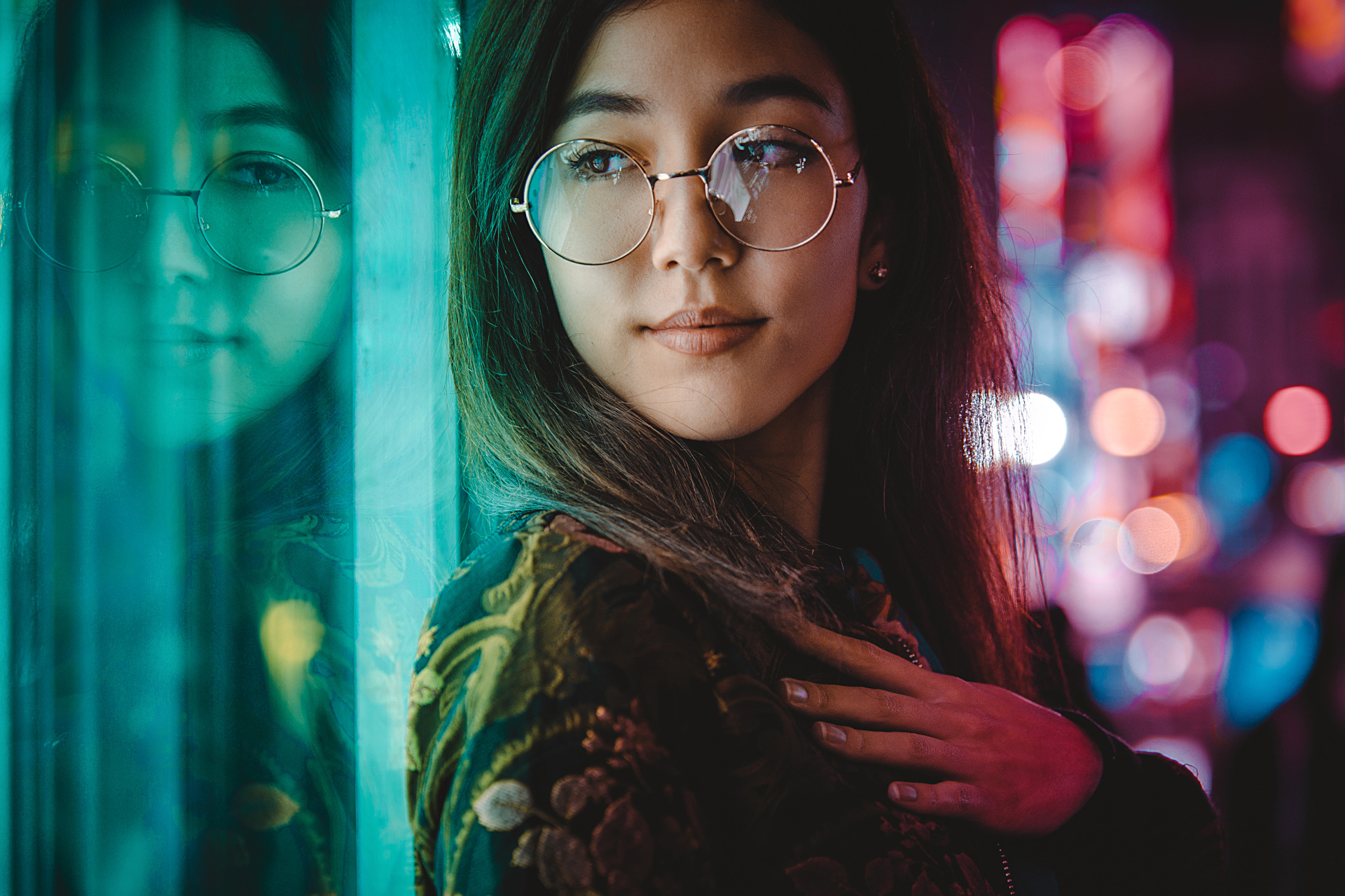 A woman and her mirrored image