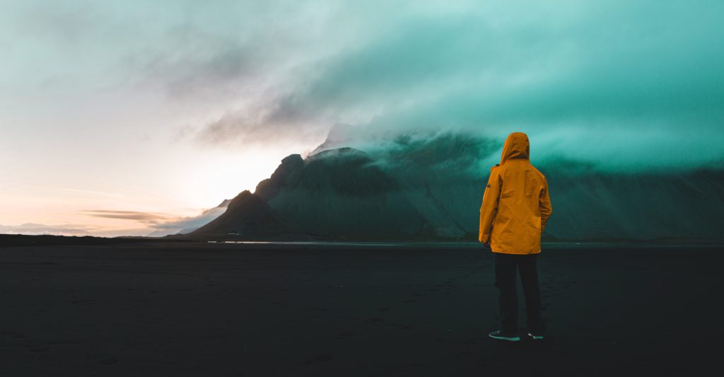 A person looking at a bad weather front